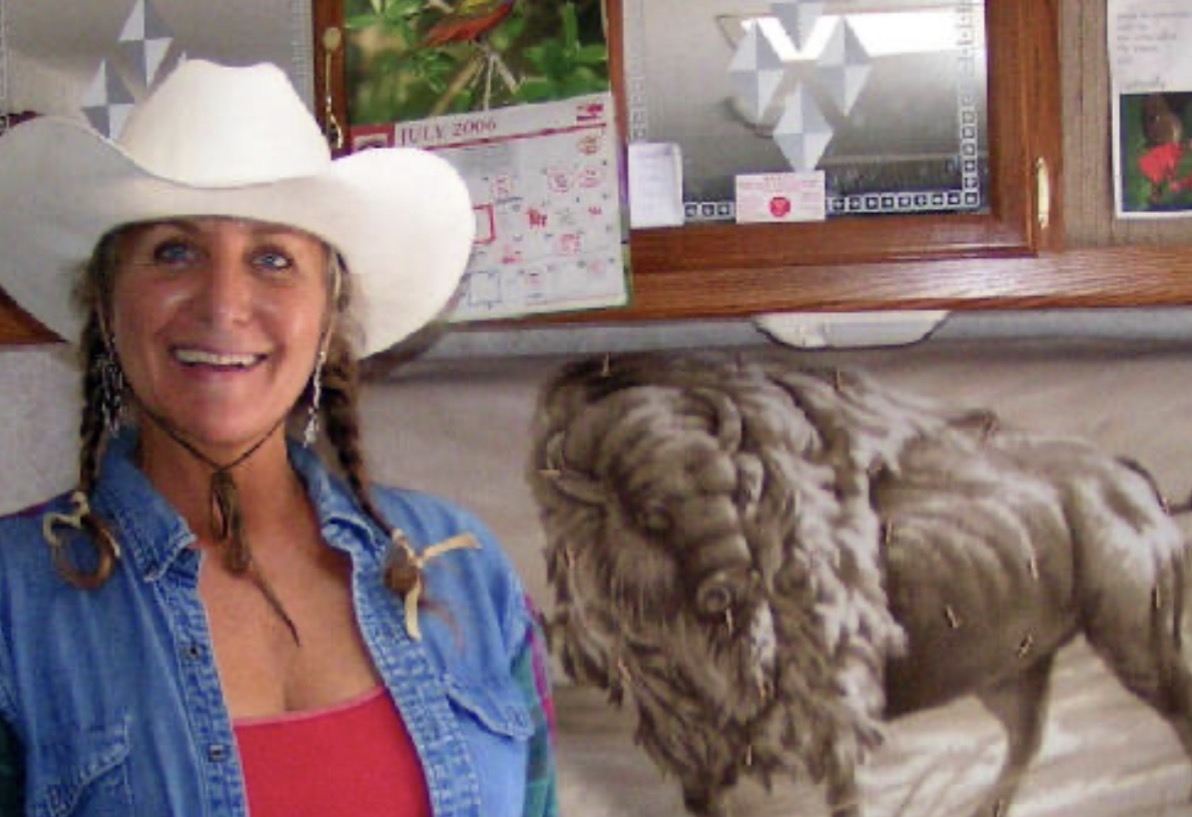 Bunny wearing cowboy hat next to buffalo pencil artwork